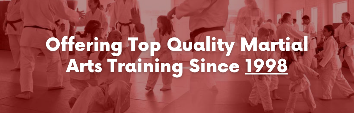 White text that reads "Offering Top Quality Martial Arts Training Since 1998" on a red background. 