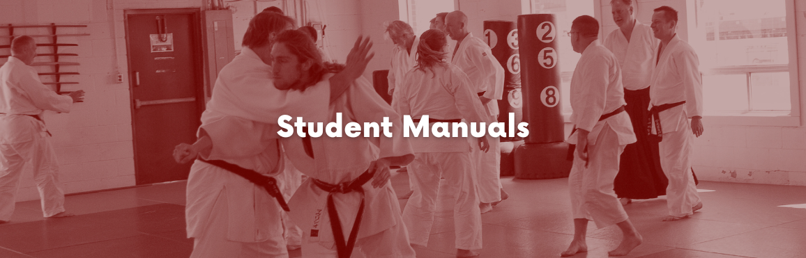 White text that reads “Student Manuals" overlaid on a photo of people participating in an aikido class. 